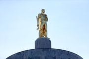 The Oregon Pioneer, aka Gold Man, atop the state capitol building in Salem on Saturday, Jan. 29, 2022.