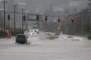 Heavy rain causes high water and flooding along Highway 101 in Tillamook, Oregon on Tuesday, Dec. 5, 2023.