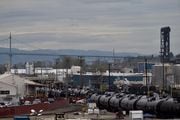 Crude oil tank cars line up at Zenith Energy's terminal in Northwest Portland. Multnomah County commissioners have asked the Oregon Department of Environmental Quality to deny an air quality permit that would allow Texas-based Zenith Energy to continue storing crude oil at the terminal.