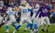Los Angeles Chargers quarterback Justin Herbert (10) passes against the Minnesota Vikings during the second half of an NFL football game, Sunday, Sept. 24, 2023, in Minneapolis.
