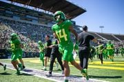 Oregon wide receiver Justius Lowe (#14) and the green team before the Ducks hold their annual spring football game at Autzen stadium in Eugene, Oregon on Saturday, April 29,, 2023. 