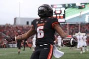 “I’m not thinking about leaving,” OSU running back Damien Martinez told The Oregonian/OregonLive. “Oregon State ... showed me love the whole time. So I want to show love back.” (AP Photo/Amanda Loman)