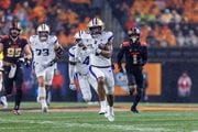 Did running back Dillon Johnson (#7) and the Washington Huskies move up to No. 1 in our power rankings after their impressive win over the Oregon State Beavers in Corvallis.