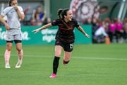 Portland Thorns forward Michele Vasconcelos (#15) celebrates after her a goal in the 23rd minute during an NWSL Challenge Cup match against Angel City at Providence Park on Wednesday, May 31, 2023. 