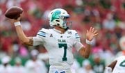 TAMPA, FLORIDA - OCTOBER 15: Michael Pratt #7 of the Tulane Green Wave passes during a game against the South Florida Bulls at Raymond James Stadium on October 15, 2022 in Tampa, Florida. (Photo by Mike Ehrmann/Getty Images)