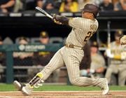 San Diego Padres' Juan Soto watches the flight of the ball during a baseball gameagainst the Chicago White Sox Friday, Sept. 29, 2023, in Chicago. (AP Photo/Charles Rex Arbogast)