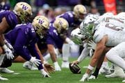 The Washington Huskies and Oregon Ducks will play a rematch for a chance to reach the College Football Playoff. (Photo by Steph Chambers/Getty Images)