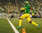 EUGENE, OREGON - SEPTEMBER 16: Wide receiver Traeshon Holden #5 of the Oregon Ducks runs the ball in for a touchdown during the second half of the game against the Hawaii Rainbow Warriors at Autzen Stadium on September 16, 2023 in Eugene, Oregon. The Ducks went on to win 55-10. (Photo by Ali Gradischer/Getty Images)
