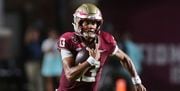 Florida State quarterback Jordan Travis (13) runs with the ball in the first quarter of an NCAA college football game against Southern Mississippi Saturday, Sept. 9, 2023, in Tallahassee, Fla. FSU won 66-13.