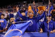 BOISE, ID - OCTOBER 08: Fans cheer on the Boise State Broncos during a regular season NCAA football game between the Fresno State Bulldogs and the Boise State Broncos Saturday, Oct. 8, 2022, at Albertsons Stadium in Boise, ID. (Marc Sanchez/Icon Sportswire via Getty Images)